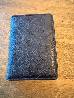 SOLD OUT embossed black Passport Holder Hello Kitty